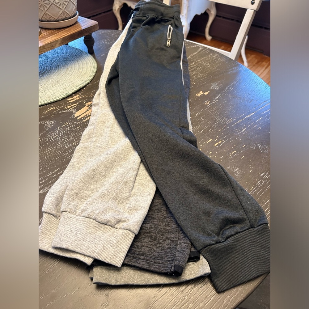 4 pair of boys size Large sweats plus a bonus 5th pair with a small hole. - Picture 3 of 10